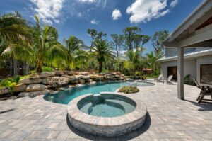 pool and spa with rock water feature